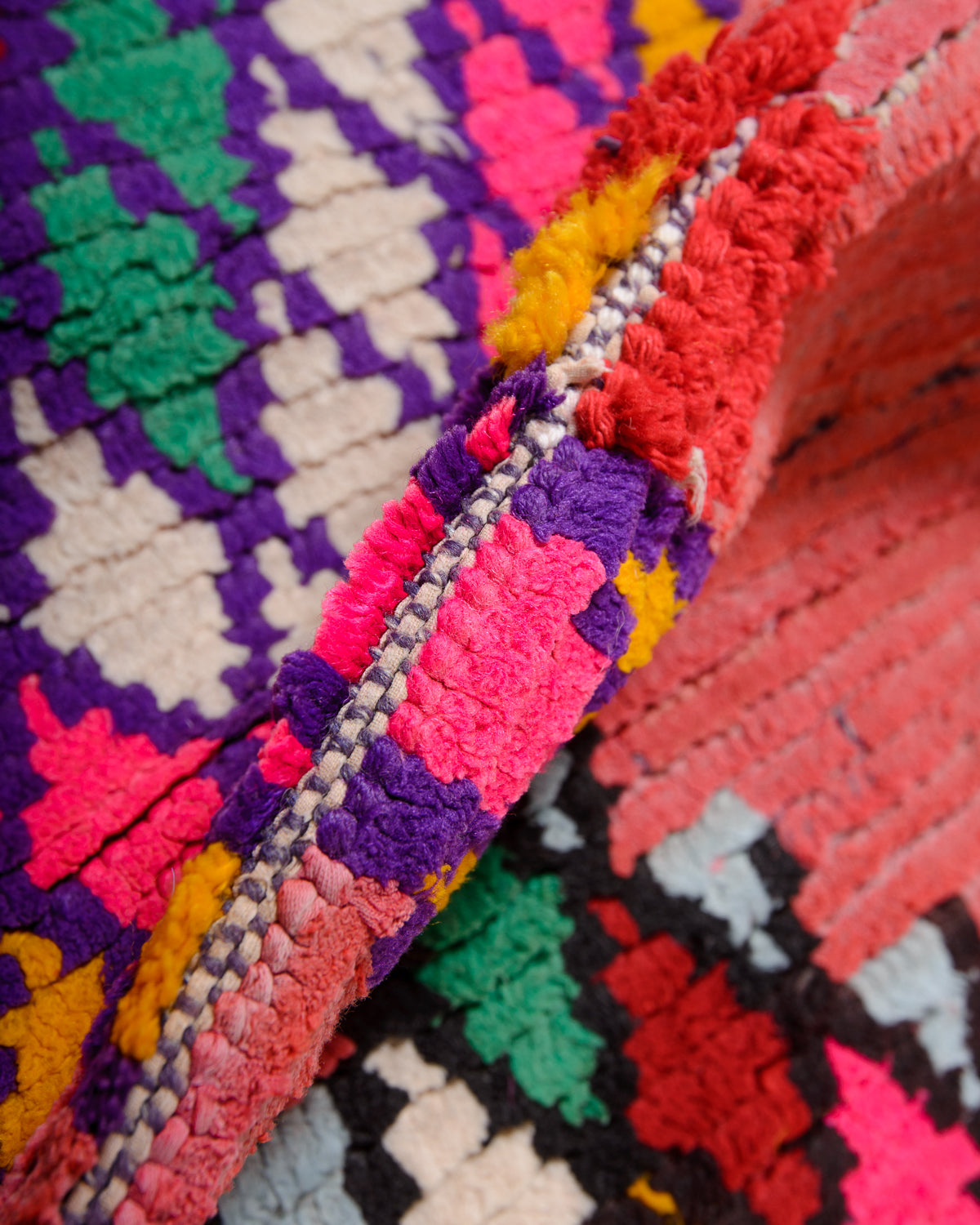 Modern, designer, handcrafted Berber runner rug from Morocco. Beniourain carpet with beautiful colours and patterns and fluffy wool texture.