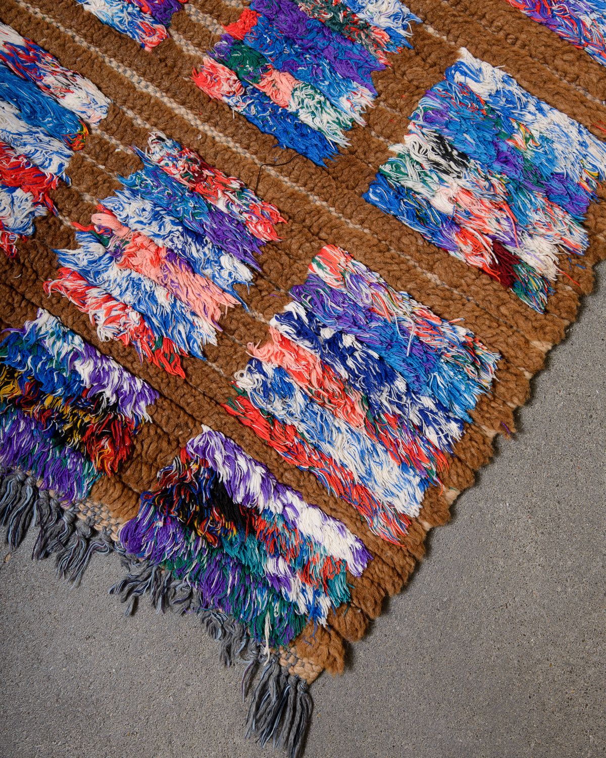 Modern, designer, handcrafted Berber runner rug from Morocco. Beniourain carpet with beautiful colours and patterns and fluffy wool texture.