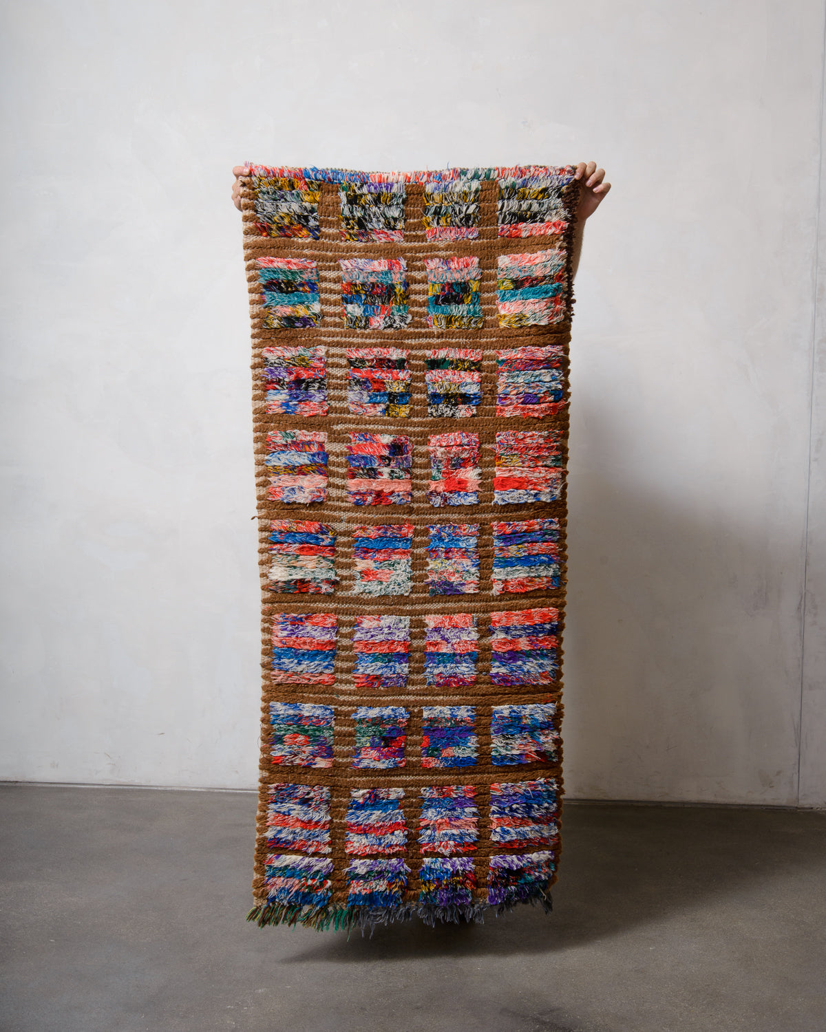 Modern, designer, handcrafted Berber runner rug from Morocco. Beniourain carpet with beautiful colours and patterns and fluffy wool texture.