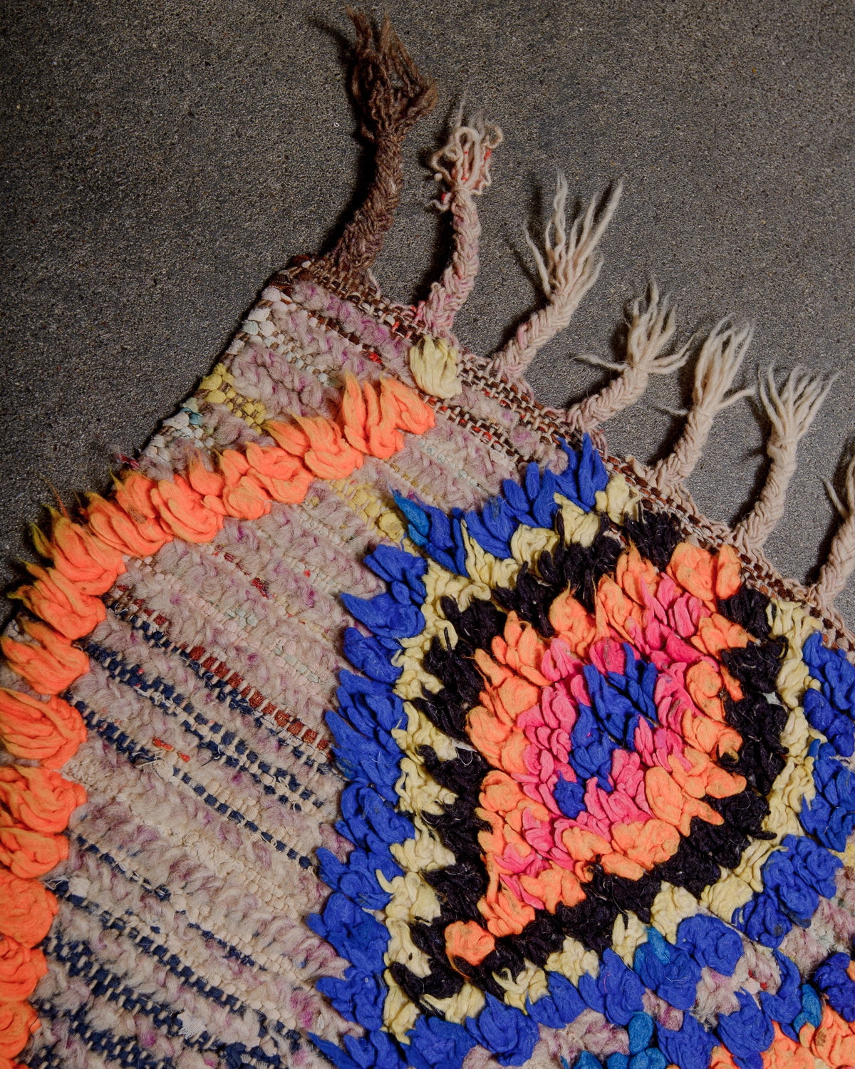Cotton tassels on Berberlin Vintage Runner Rug in bright colours including neon orange and green. Made of recylced wool, yarn and cloth.