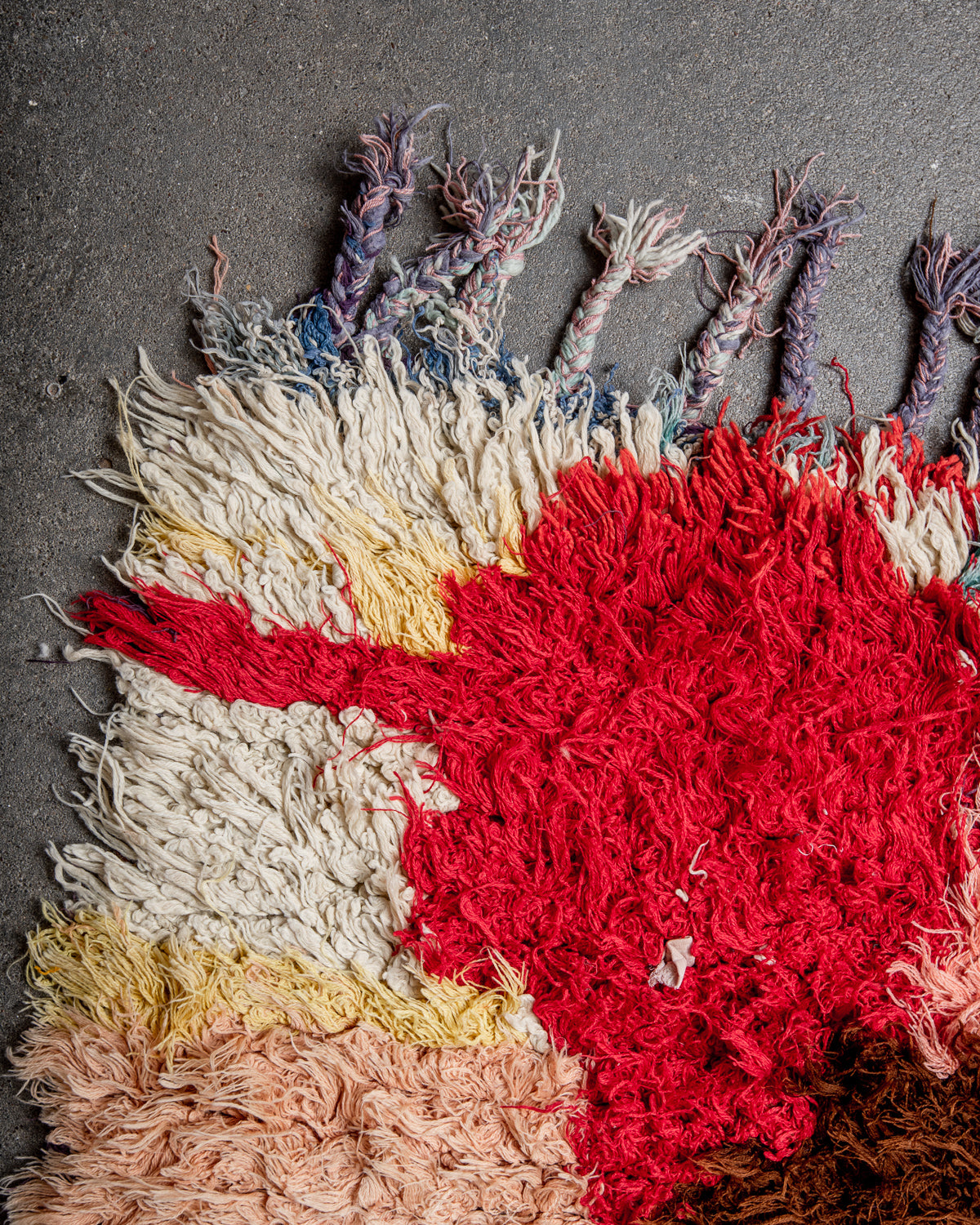 Modern designer vintage handcrafted Berber rug from Morocco. Boucherouite with beautiful colors and patterns.