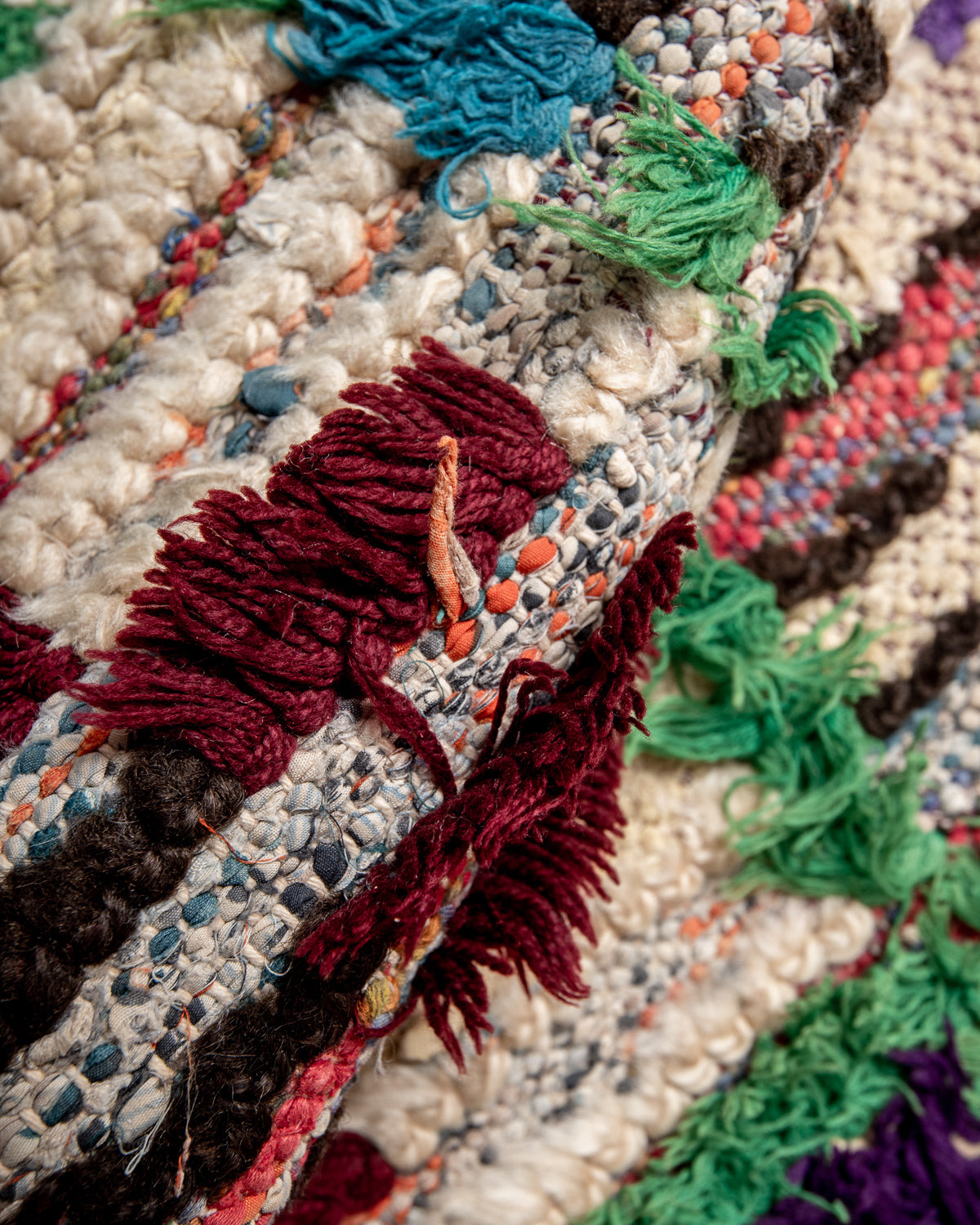 Modern designer vintage handcrafted Berber rug from Morocco. Boucherouite runner rug with beautiful colors and patterns.