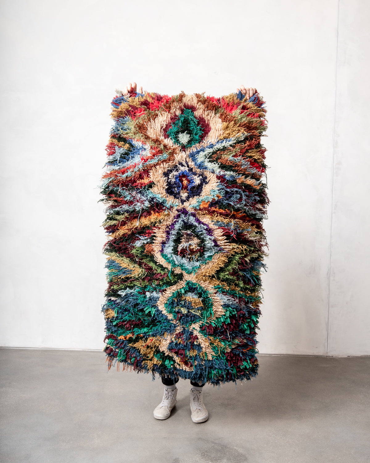 Modern designer vintage handcrafted Berber rug from Morocco. Boucherouite runner rug with beautiful colors and patterns.