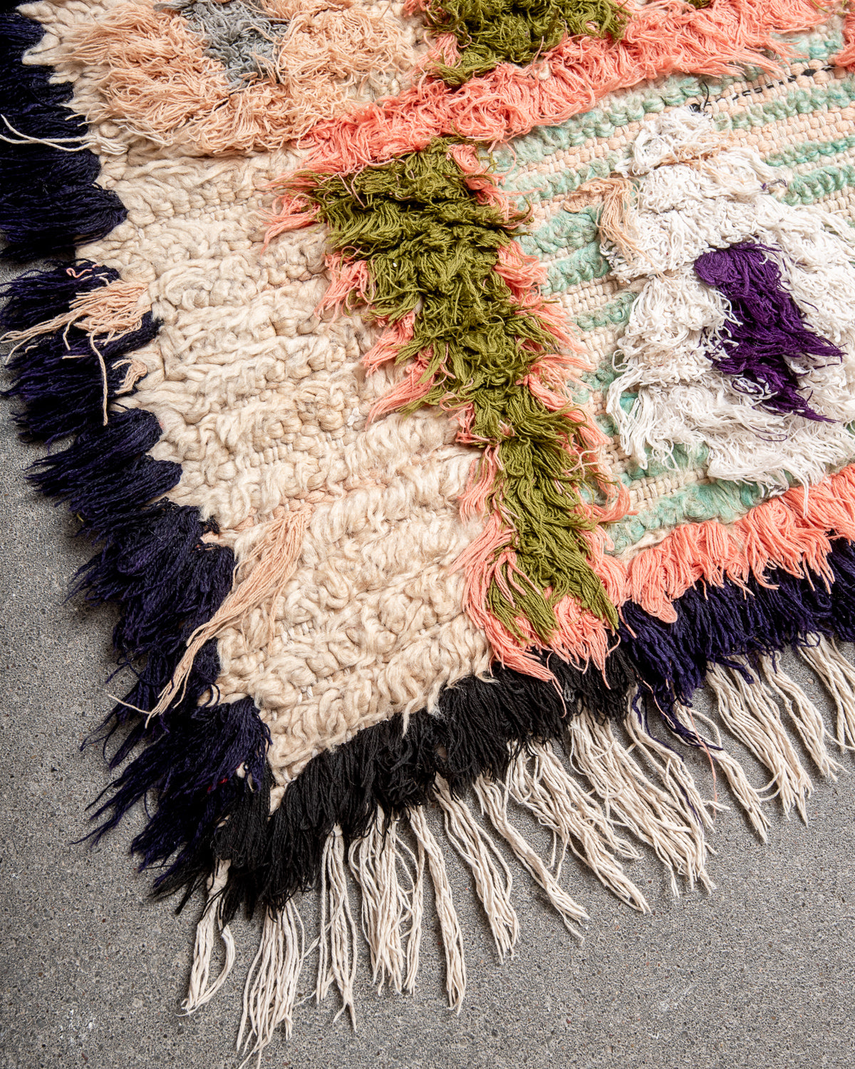 Modern designer vintage handcrafted Berber rug from Morocco. Boucherouite runner rug with beautiful colors and patterns.