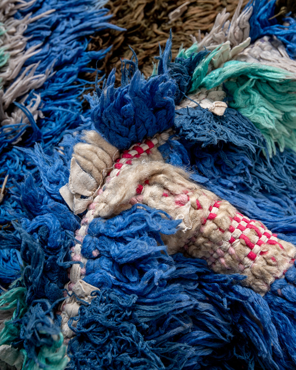 Modern designer vintage handcrafted Berber rug from Morocco. Boucherouite runner rug with beautiful colors and patterns.