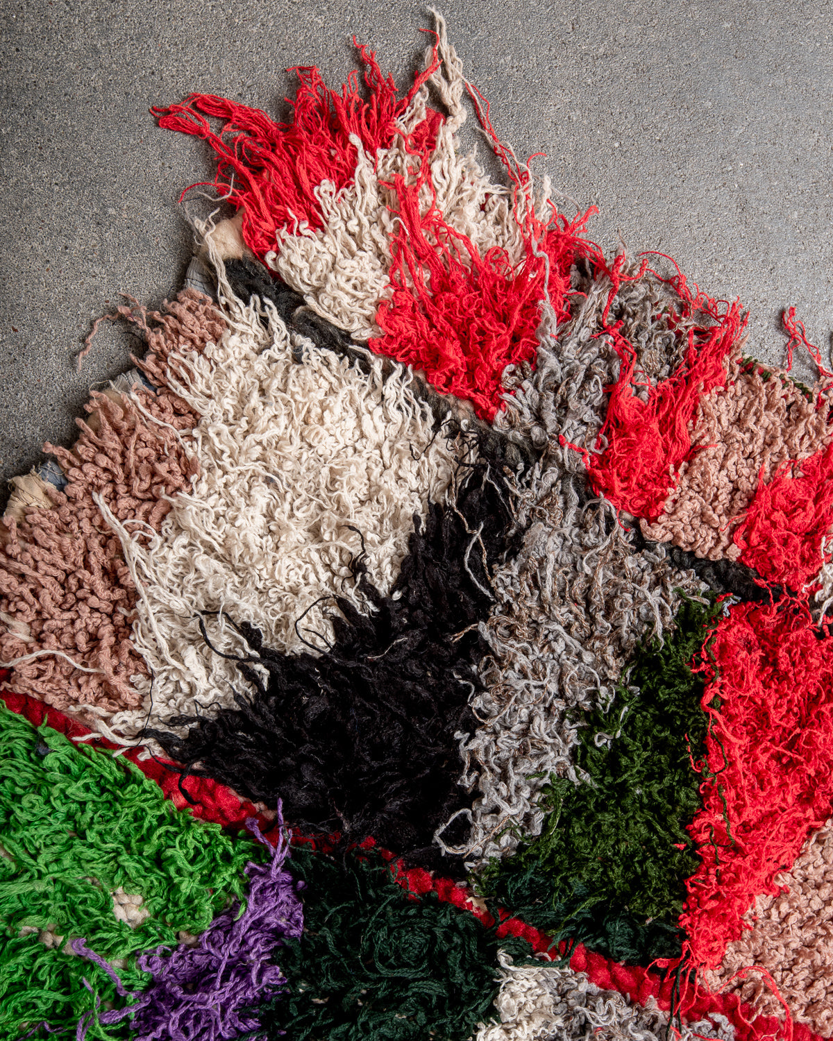 Modern designer vintage handcrafted Berber rug from Morocco. Boucherouite with beautiful colors and patterns.