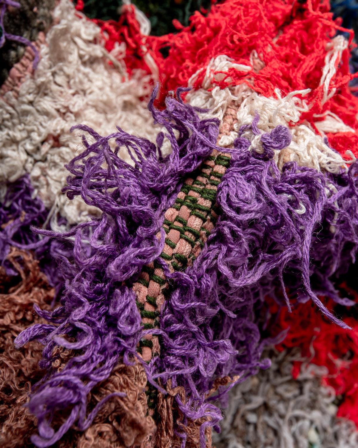 Modern designer vintage handcrafted Berber rug from Morocco. Boucherouite with beautiful colors and patterns.