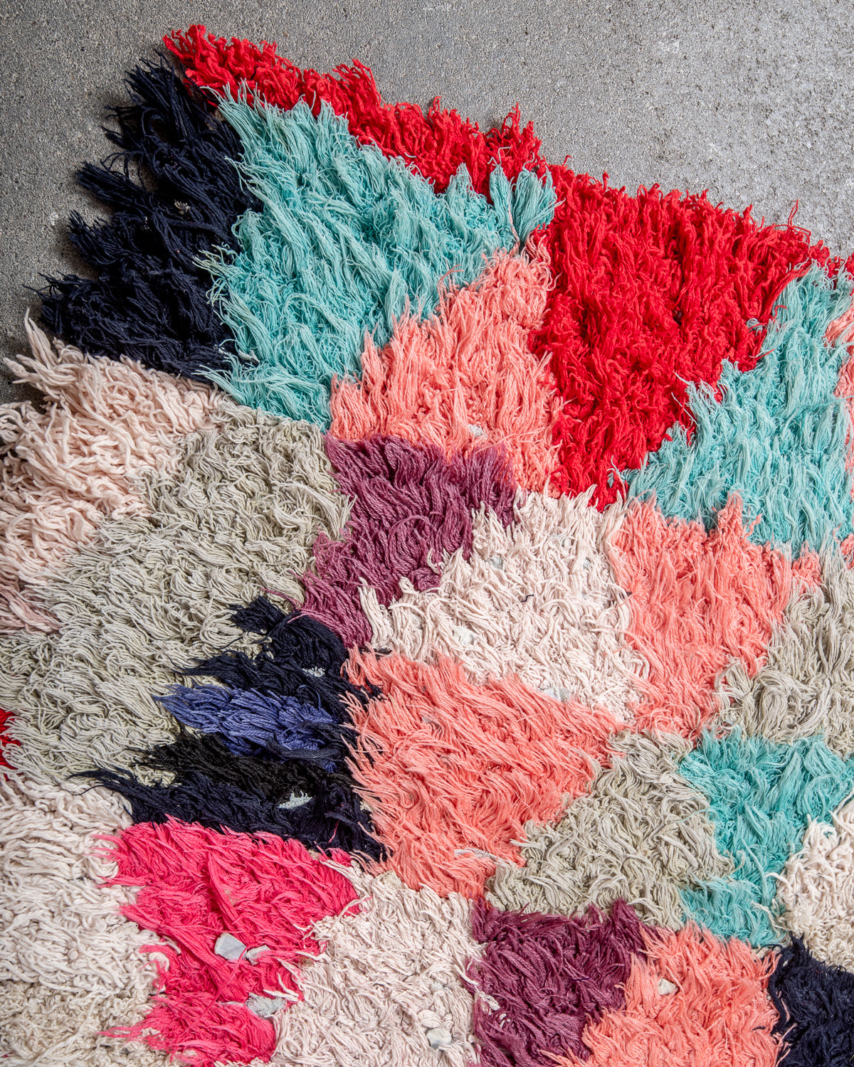 Modern designer vintage handcrafted Berber rug from Morocco. Boucherouite runner rug with beautiful colors and patterns.