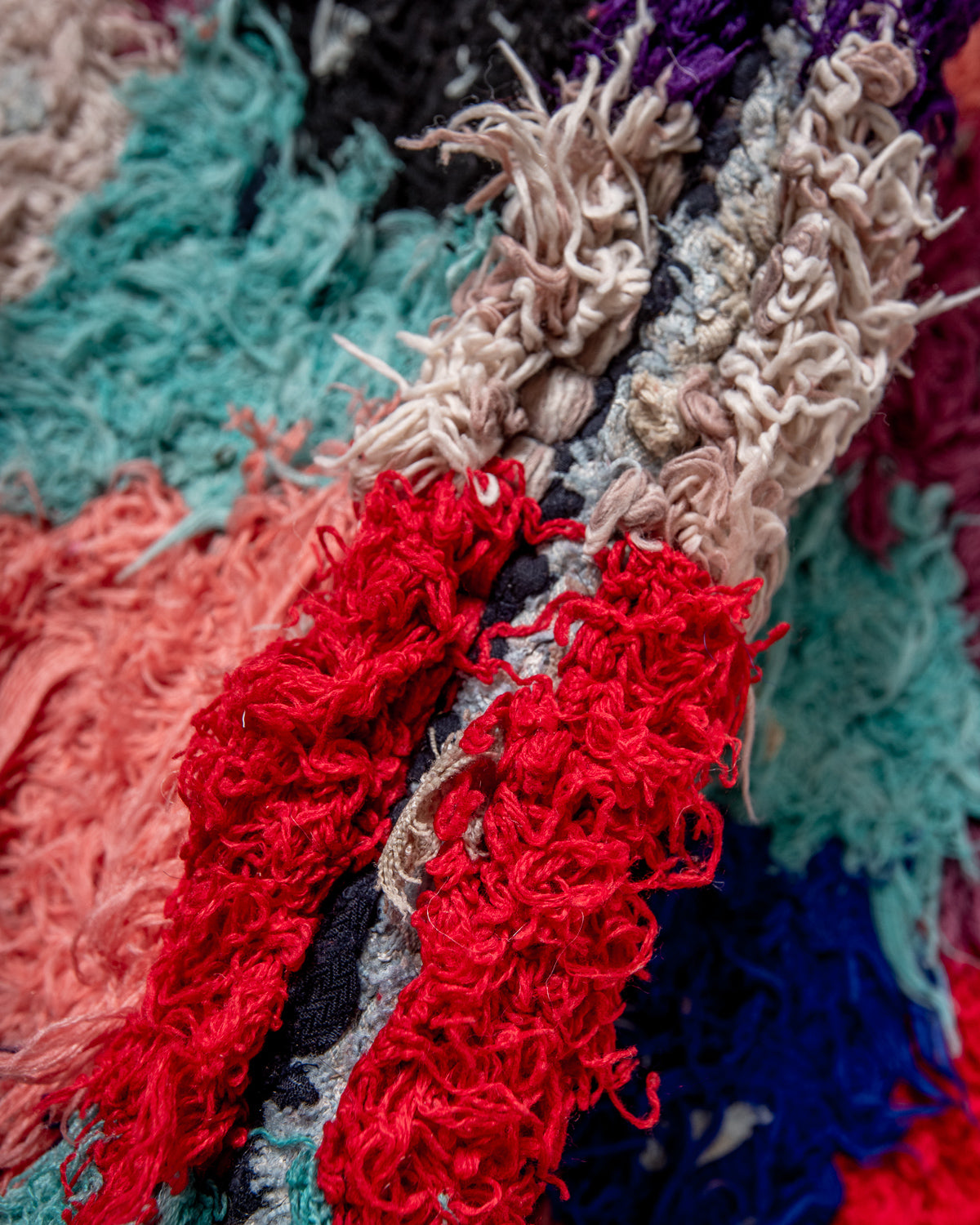 Modern designer vintage handcrafted Berber rug from Morocco. Boucherouite runner rug with beautiful colors and patterns.