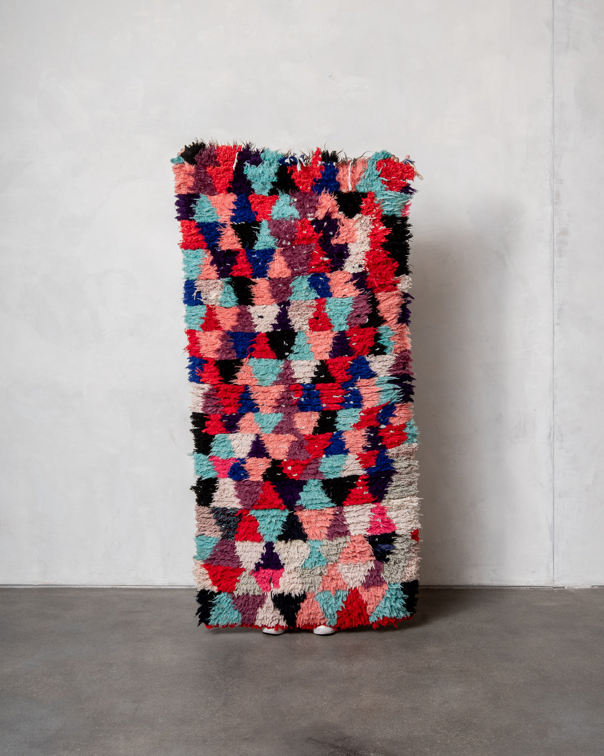 Modern designer vintage handcrafted Berber rug from Morocco. Boucherouite runner rug with beautiful colors and patterns.