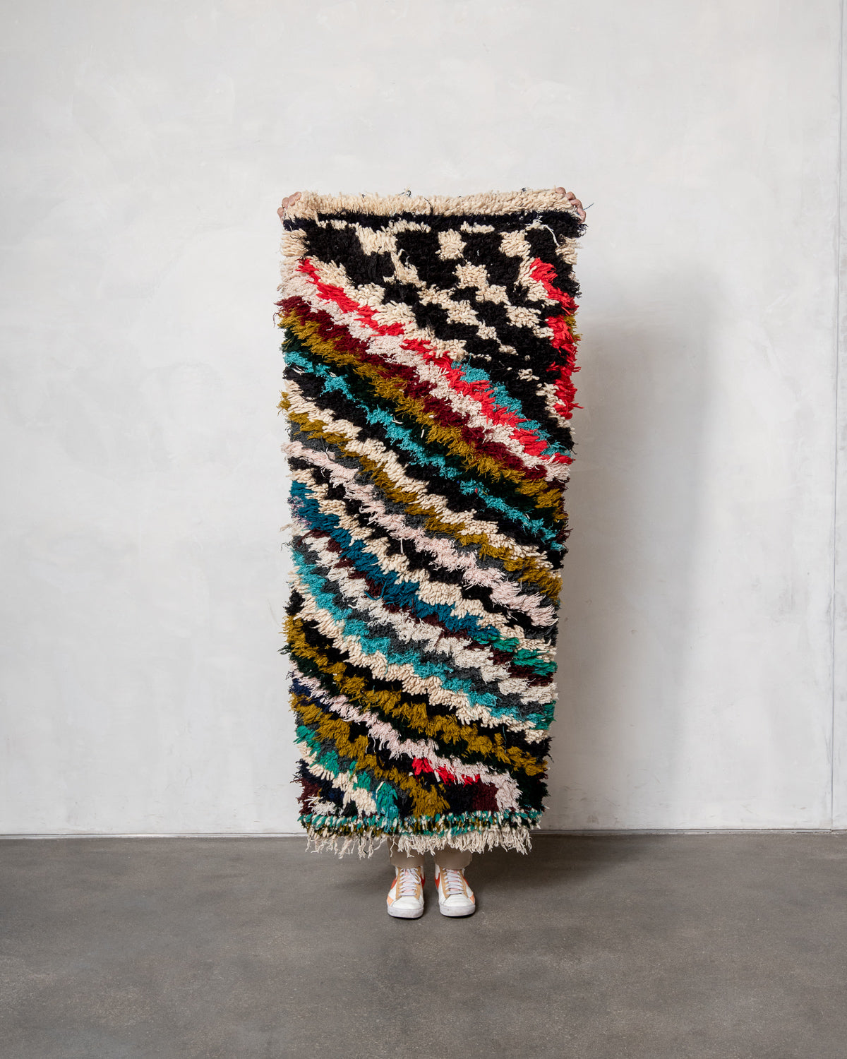 Modern designer vintage handcrafted Berber rug from Morocco. Boucherouite runner rug with beautiful colors and patterns.