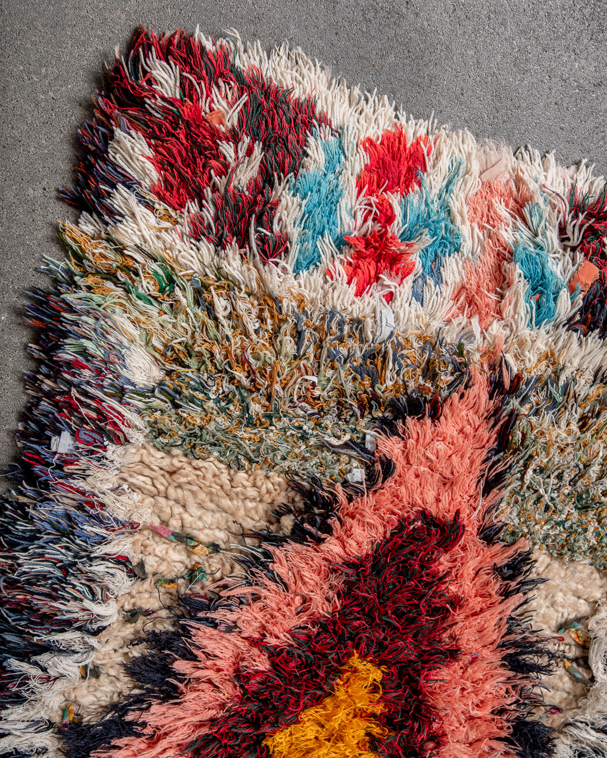 Modern designer vintage handcrafted Berber rug from Morocco. Boucherouite runner rug with beautiful colors and patterns.