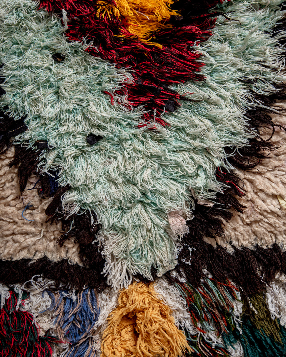 Modern designer vintage handcrafted Berber rug from Morocco. Boucherouite runner rug with beautiful colors and patterns.