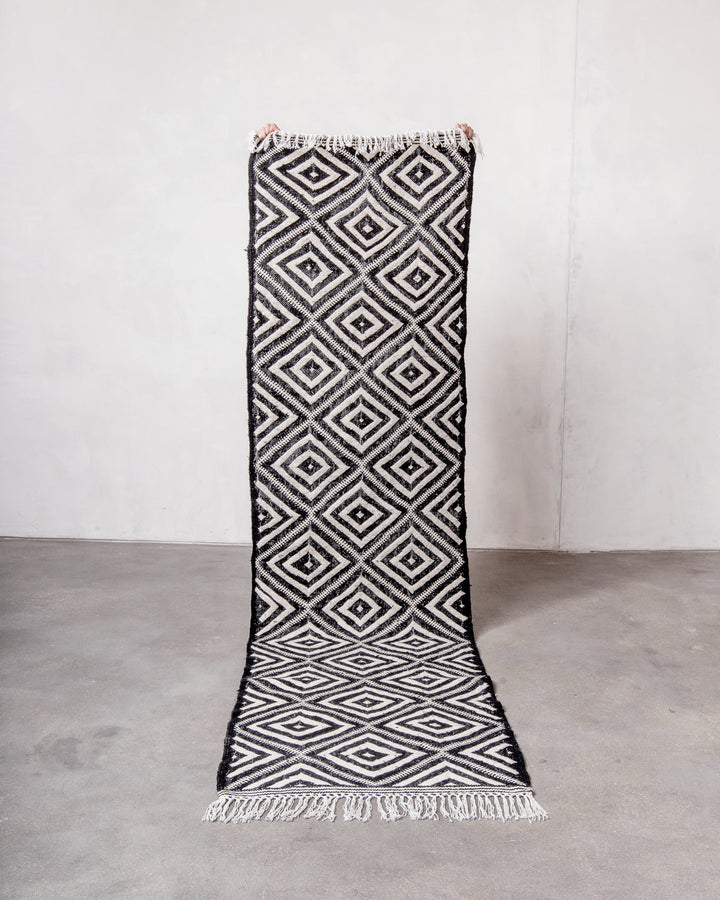 Modern, handcrafted Berber runner rug from Morocco. Flat-woven Kelim carpet in black and white design. Made of 100% wool.