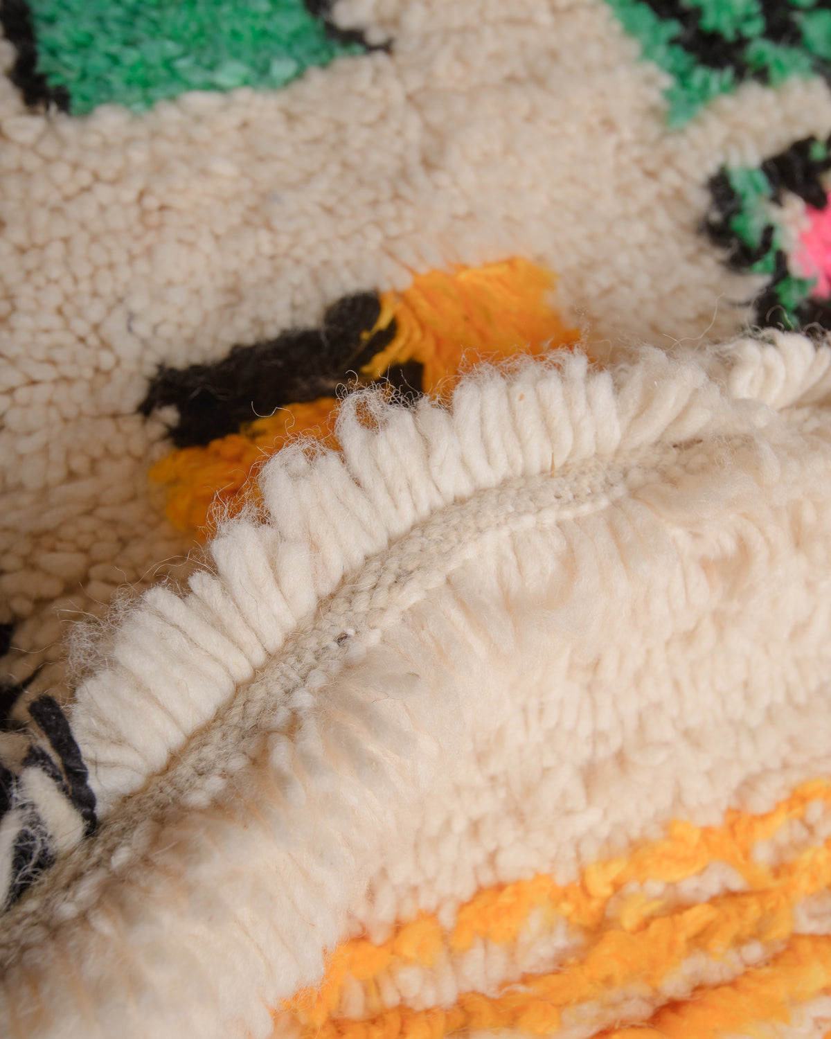 Close up of azilal rug showing gap between rows. 