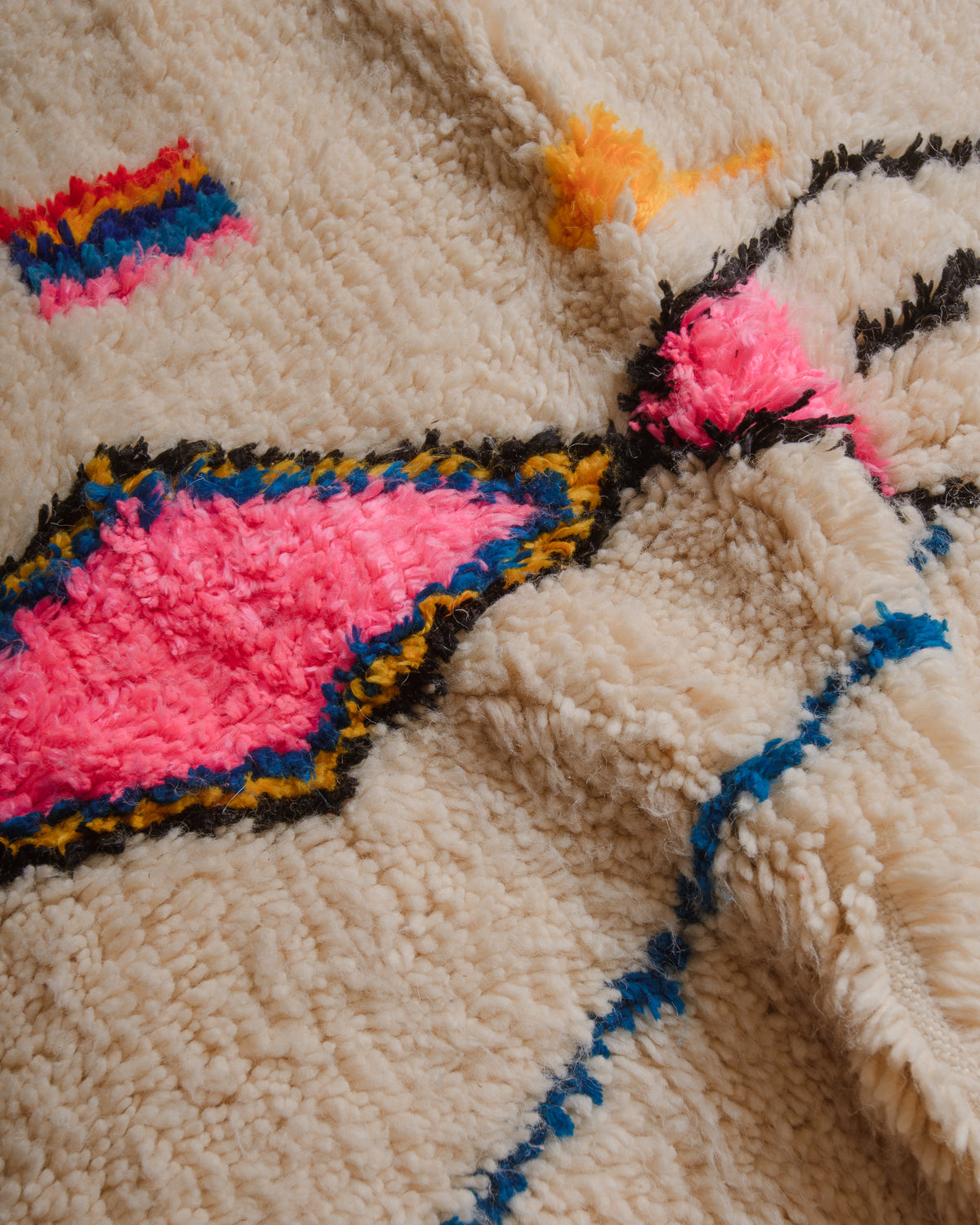 Close up of azilal rug showing wool and cotton texture.