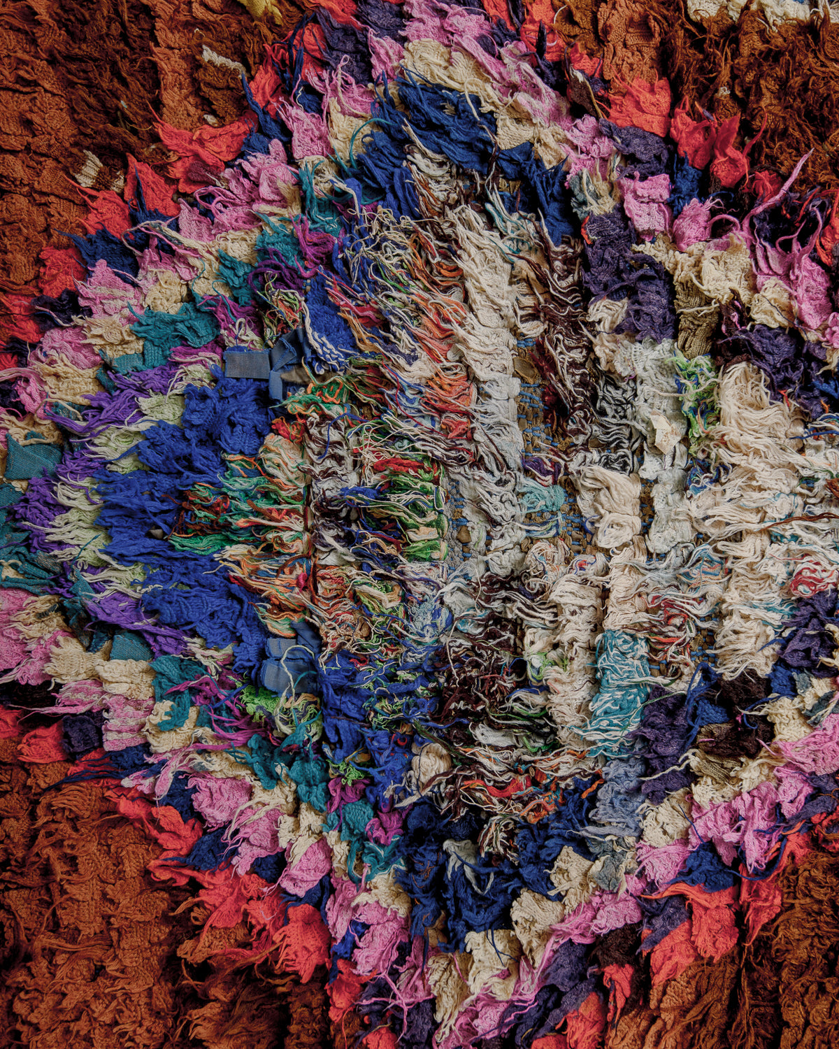 Boucherouite rug surface with colourful cotton.