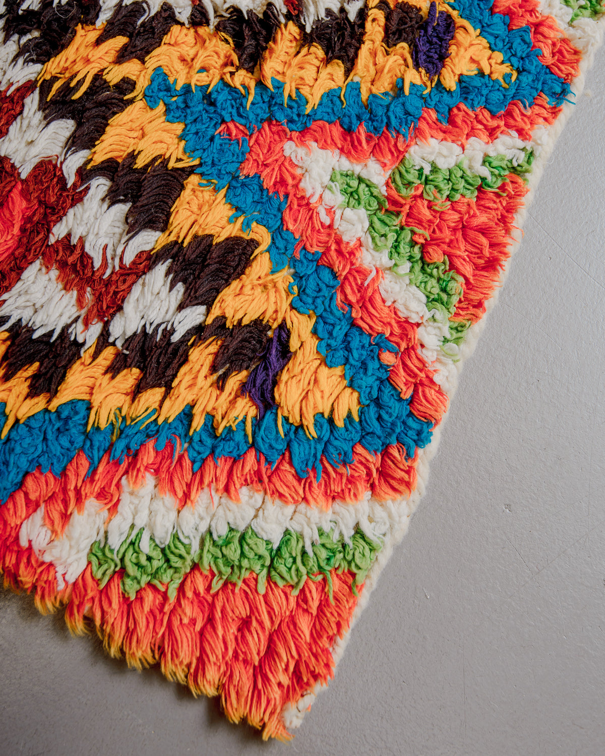 Corner of boucherouite rug.