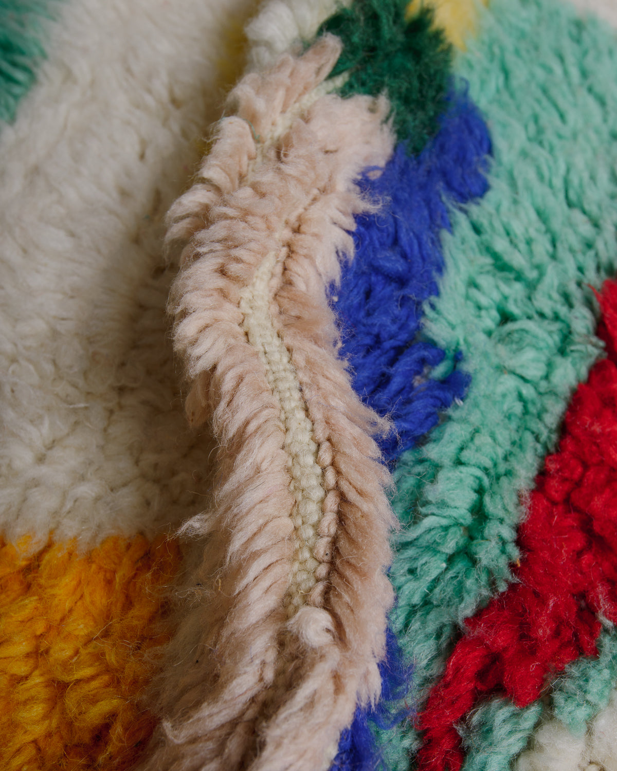 Close up of fluffy Berberlin rug.