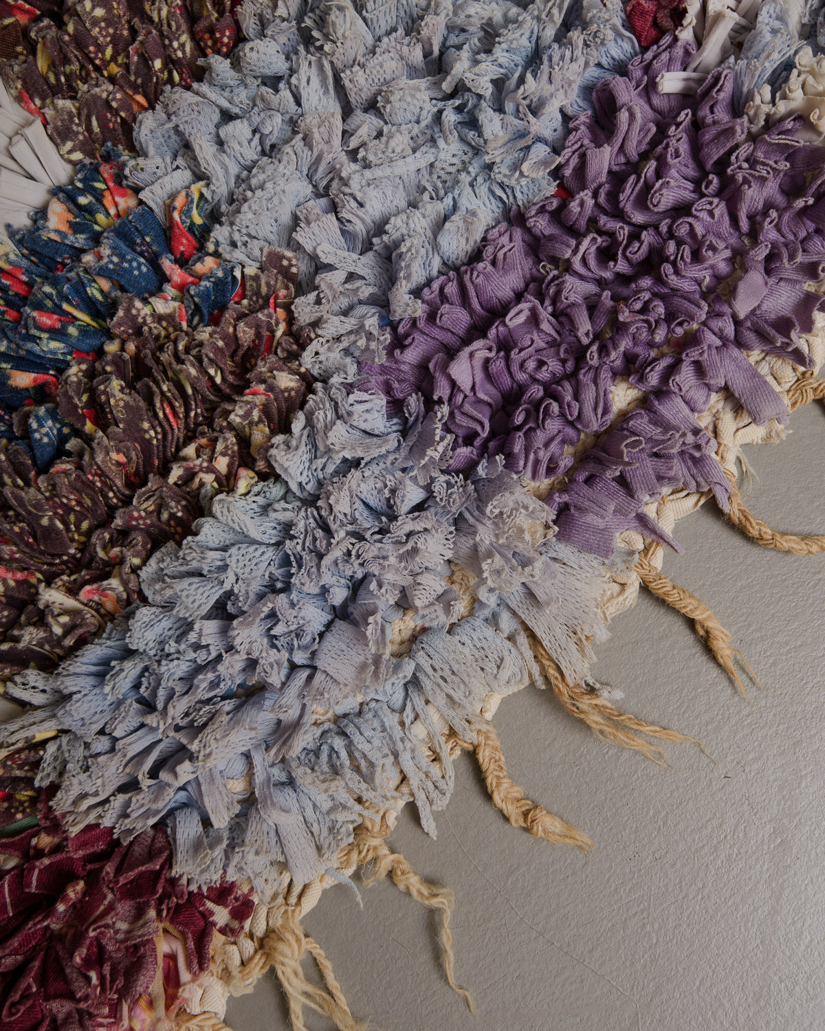 Close up of boucherouite rug made of recycled fabric remnants.