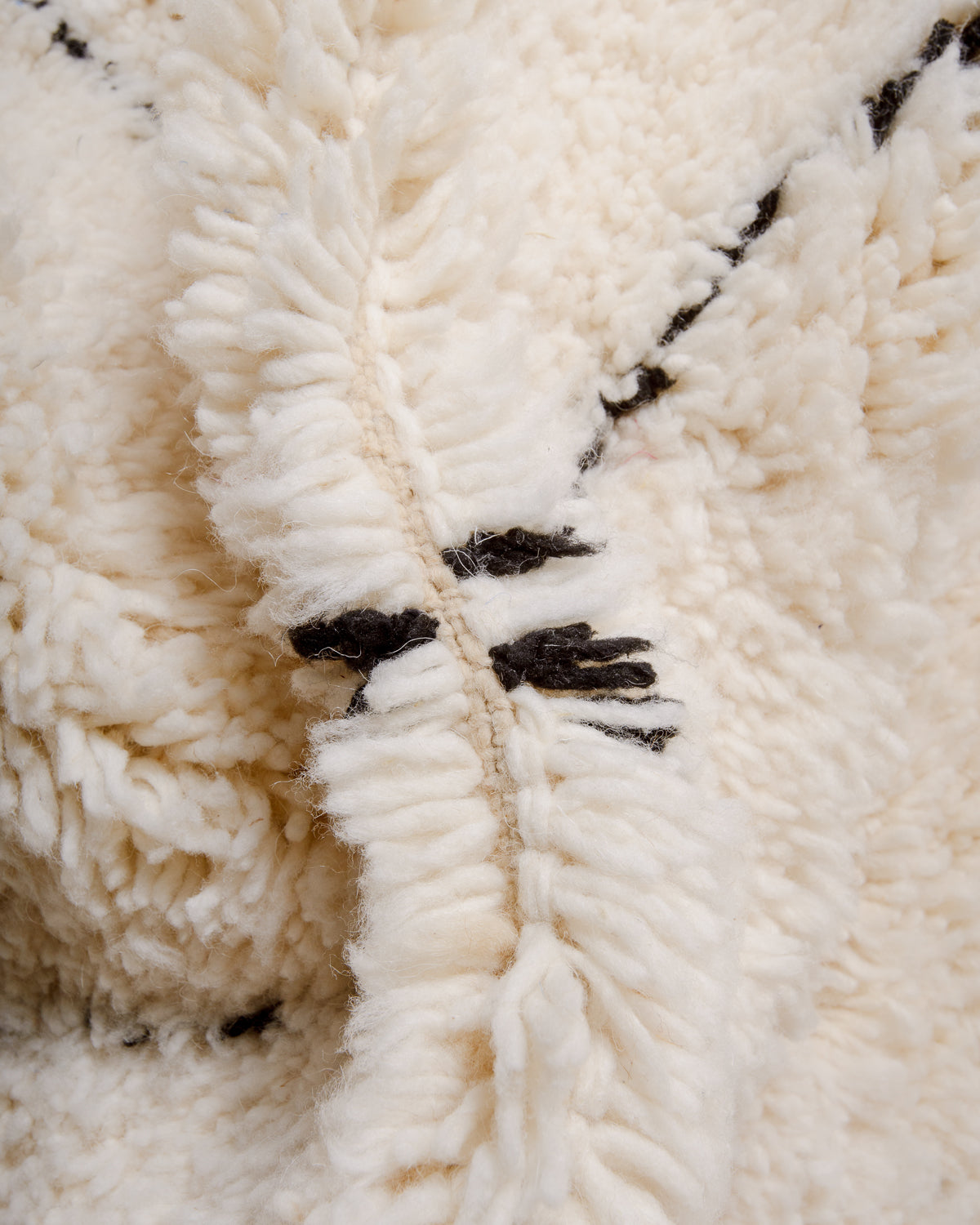 Close up of Beniourain rug showing density and thickness of wool.