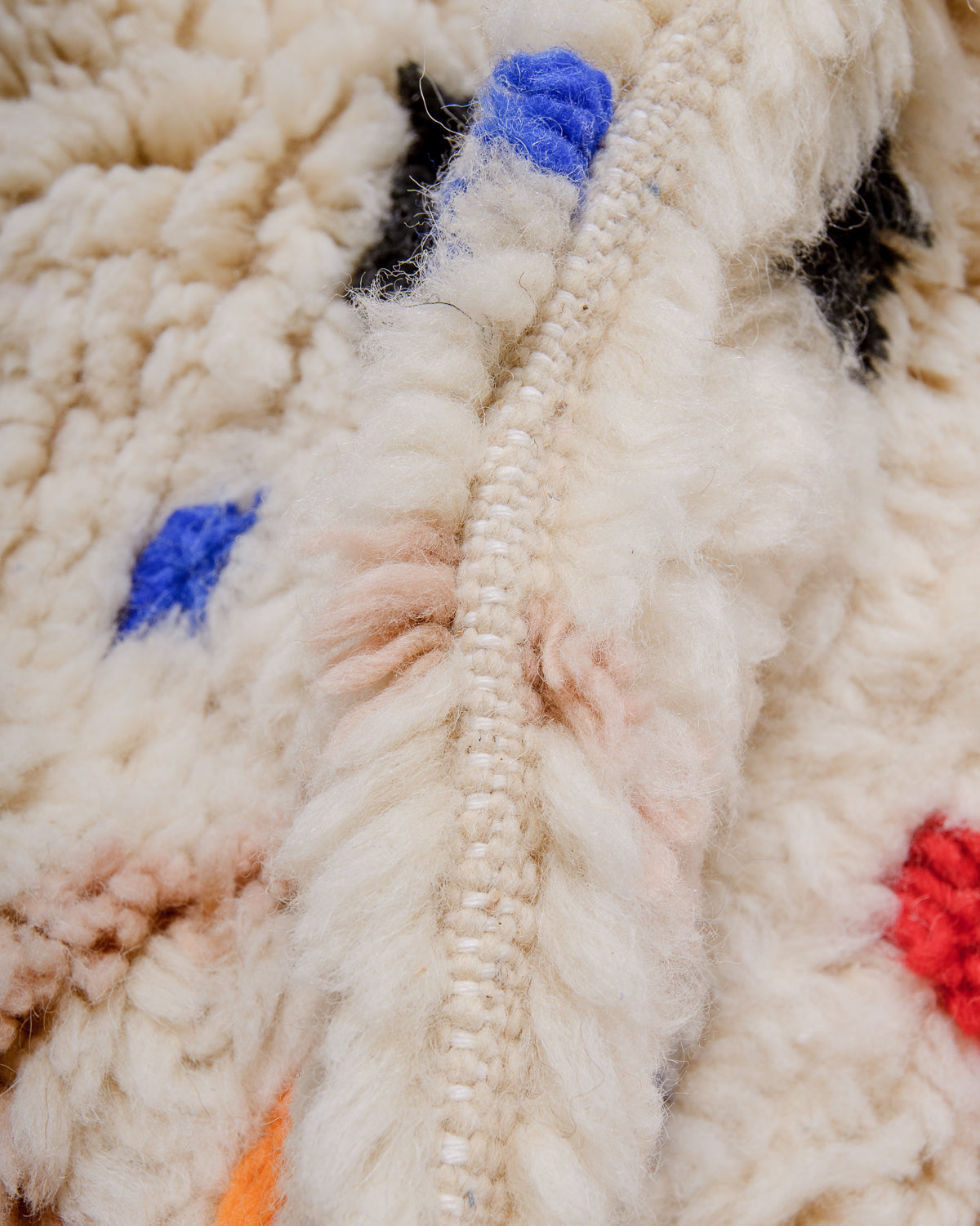 Detail of Berberlin finest rug showing thick wool pile and dense knots.