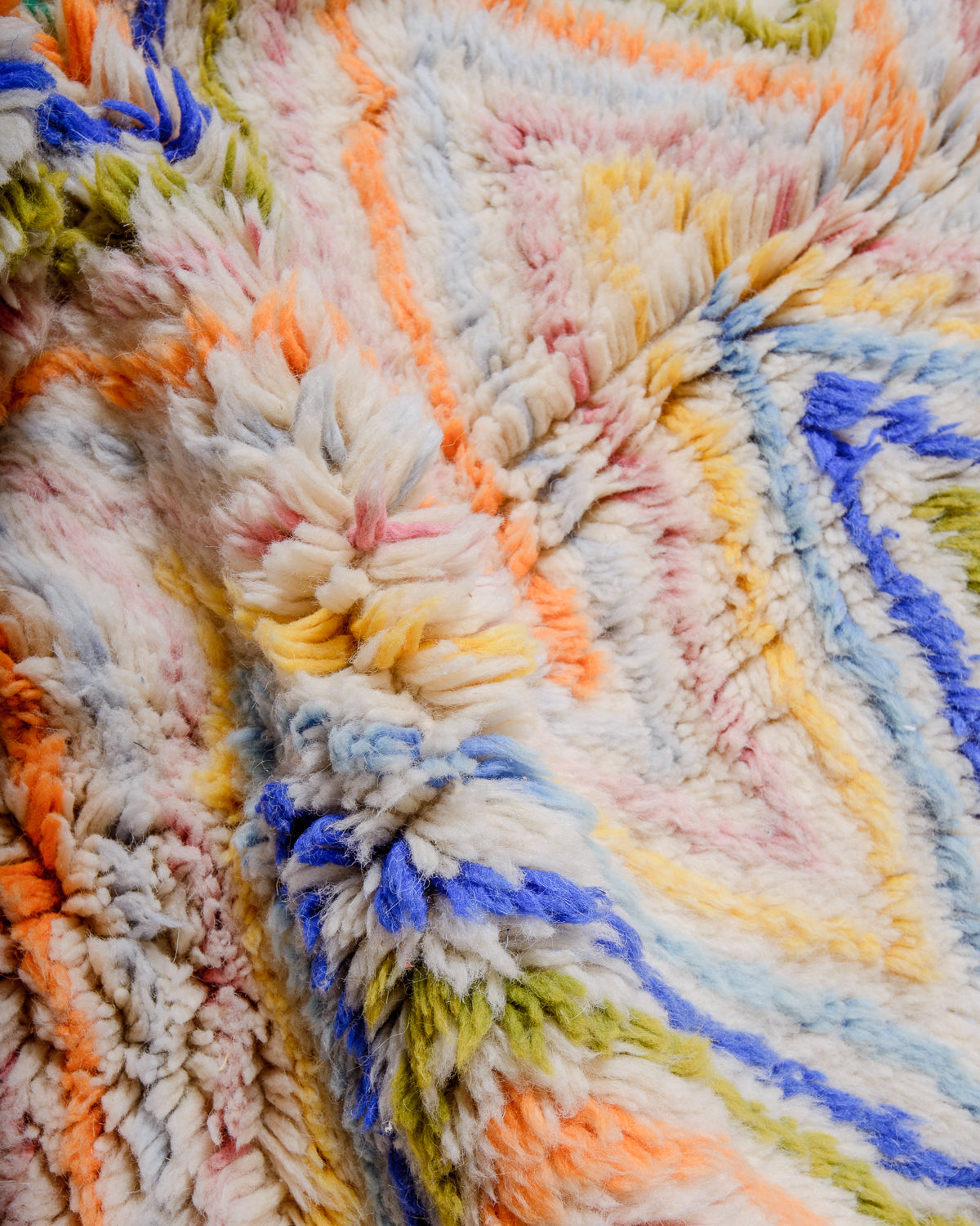 Detail of Berberlin finest rug showing rolls of fluffy wool pile.