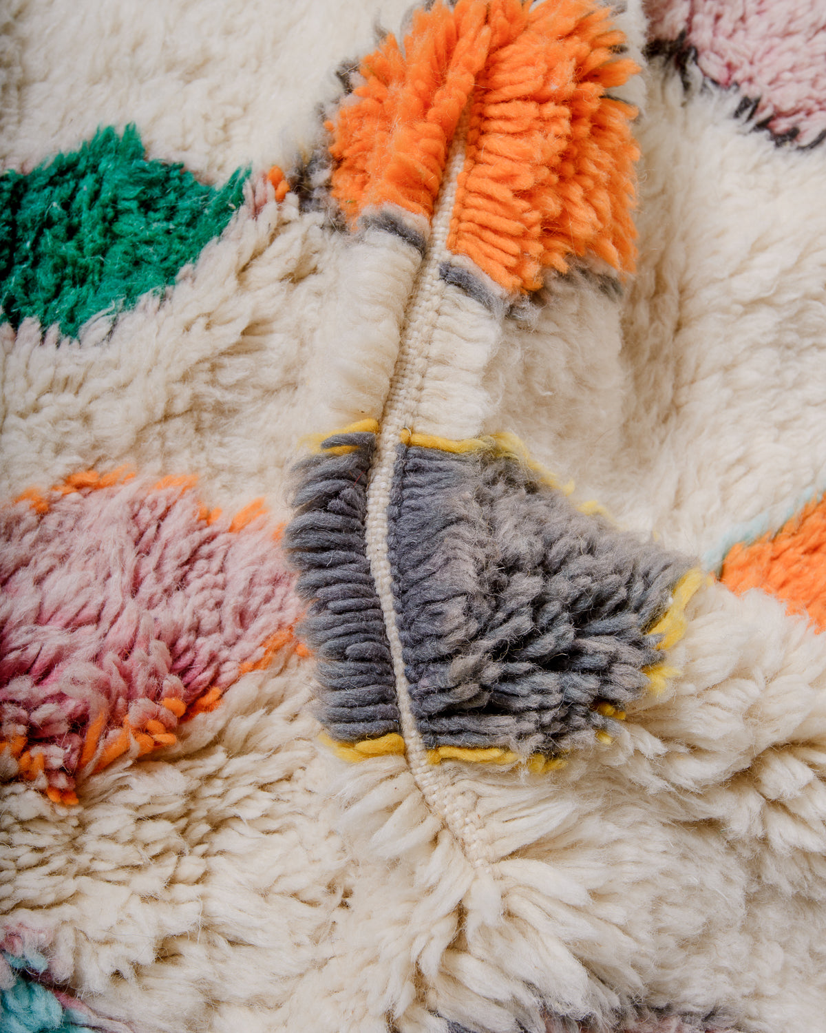 Detail of Berberlin finest rug showing fluffy wool pile and dense knots.