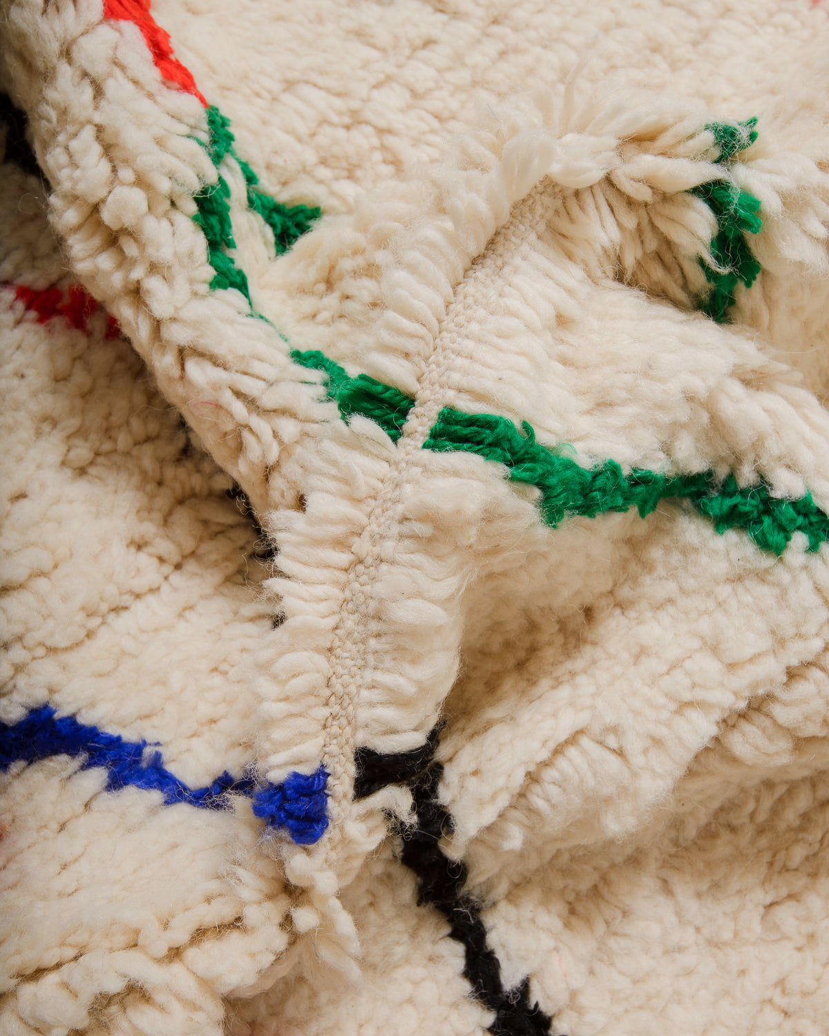 Close-up of Azilal rug showing the fluffy wool and the spacing between the rows.