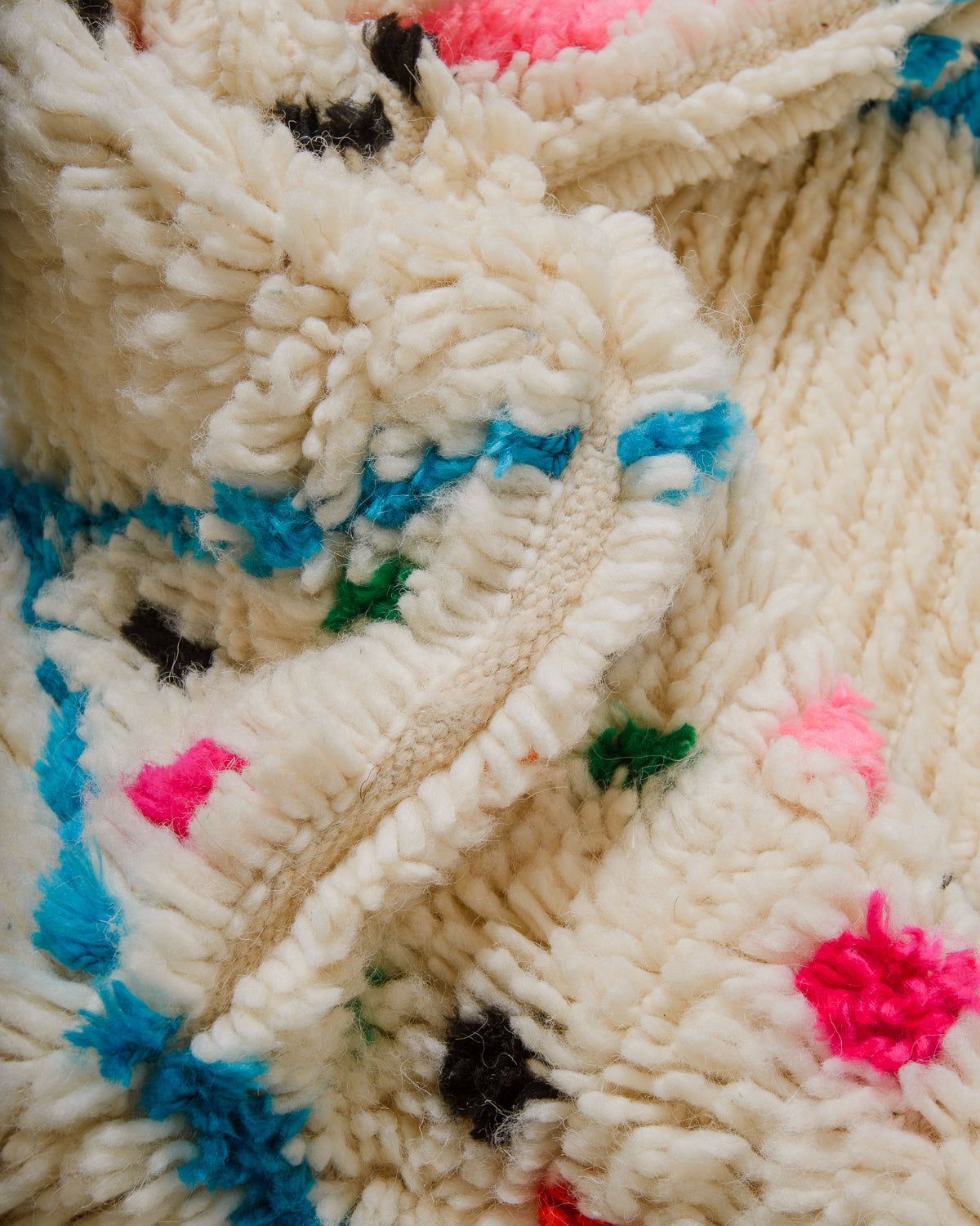 Close-up of Azilal rug showing the fluffy wool and the spacing between the rows.
