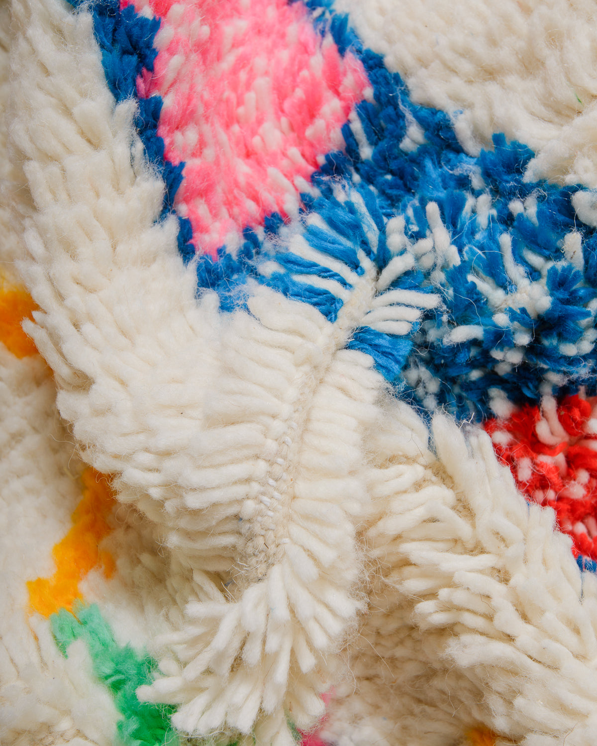 Detail of Azilal rug showing the fluffy wool, soft cotton and the spacing between the rows.