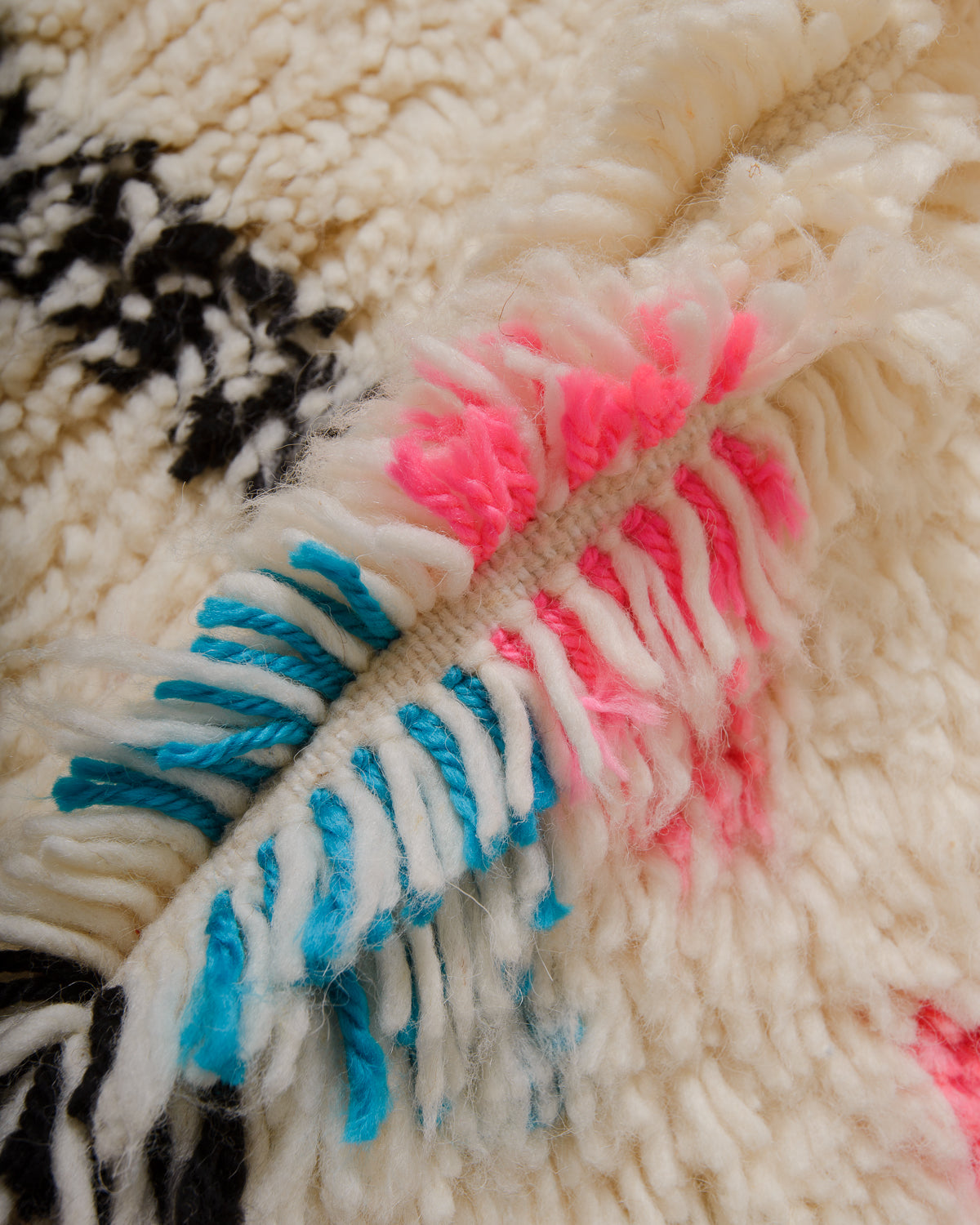 Detail of Azilal rug showing the fluffy wool and the spacing between the rows.