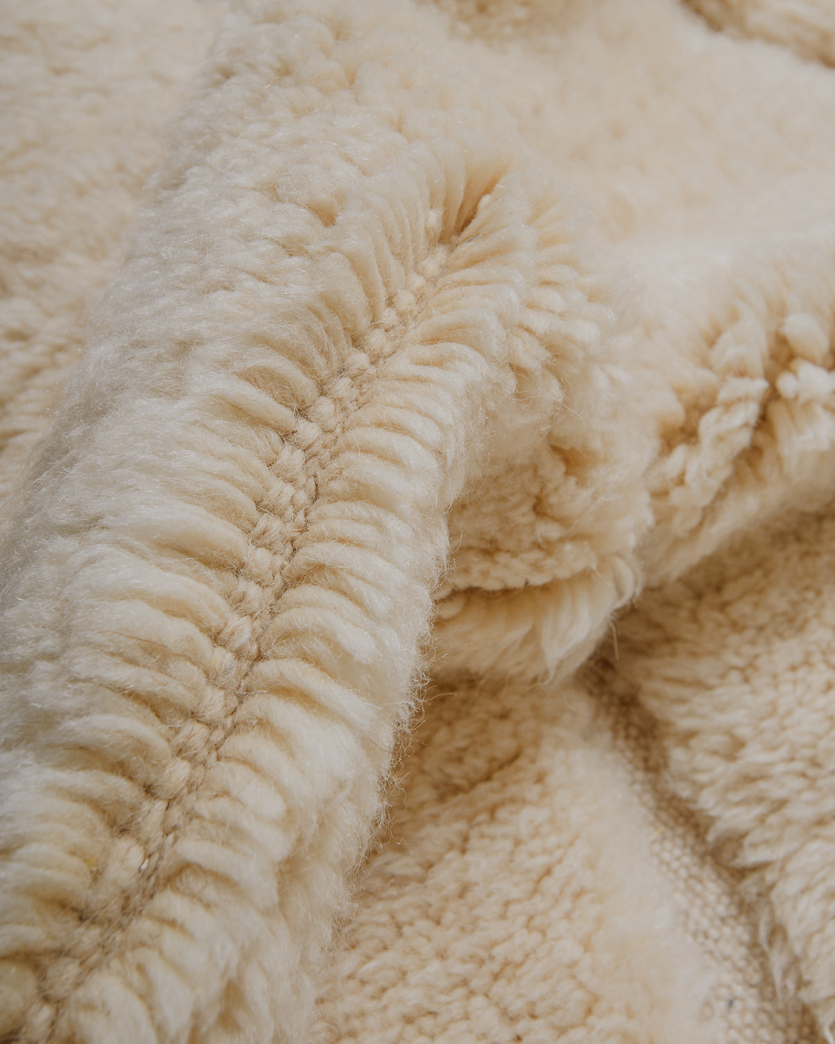 Close-up of cream wool rug