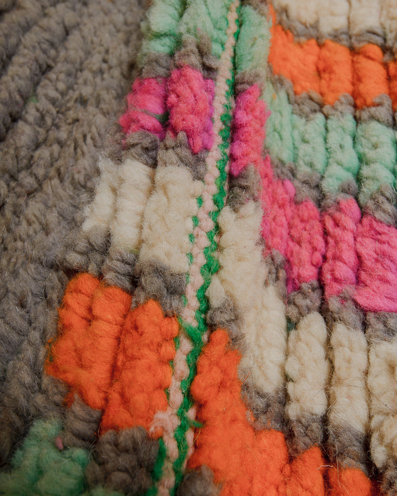 Close up of vintage wool rug showing density of wool pile. 