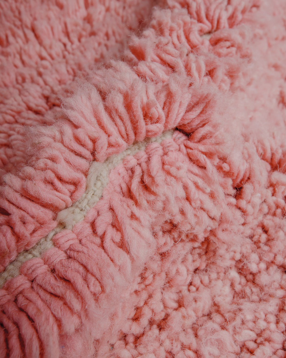 Close up of vintage boujaad rug showing length of pile.