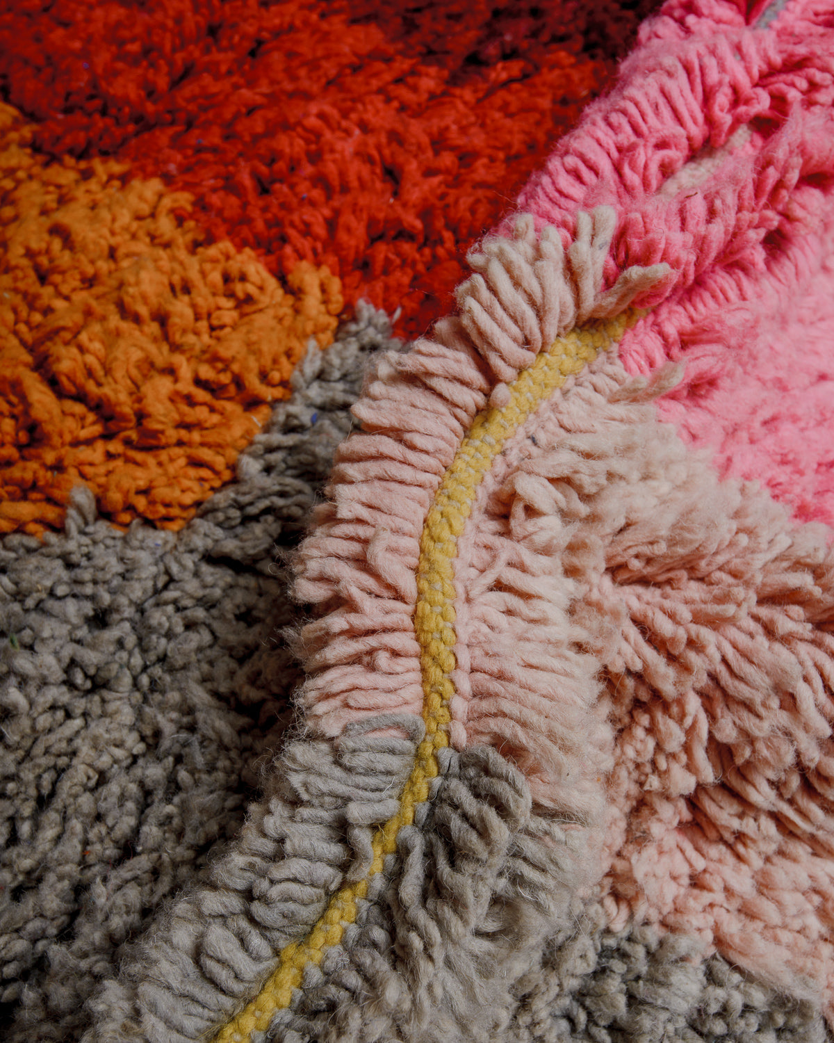 Close up of vintage boujaad rug showing length of pile and wefted rows.