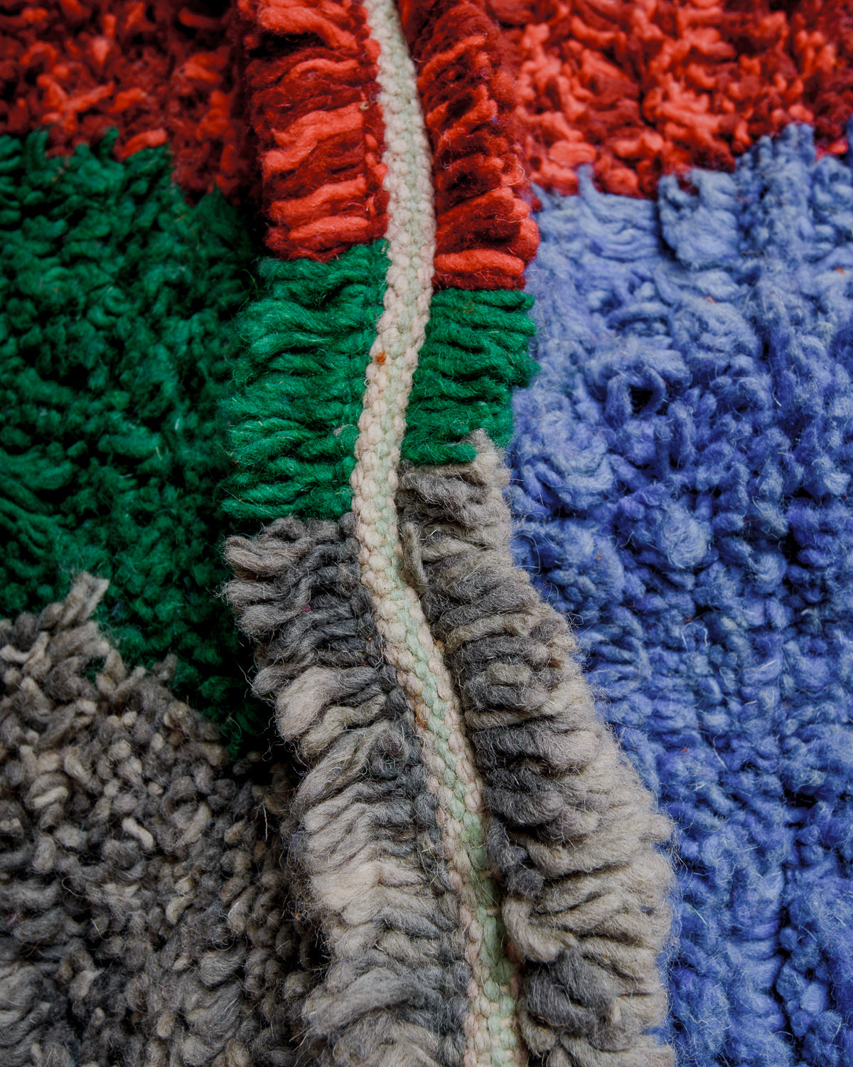 Close up of vintage boujaad rug showing length of pile and wefted rows.