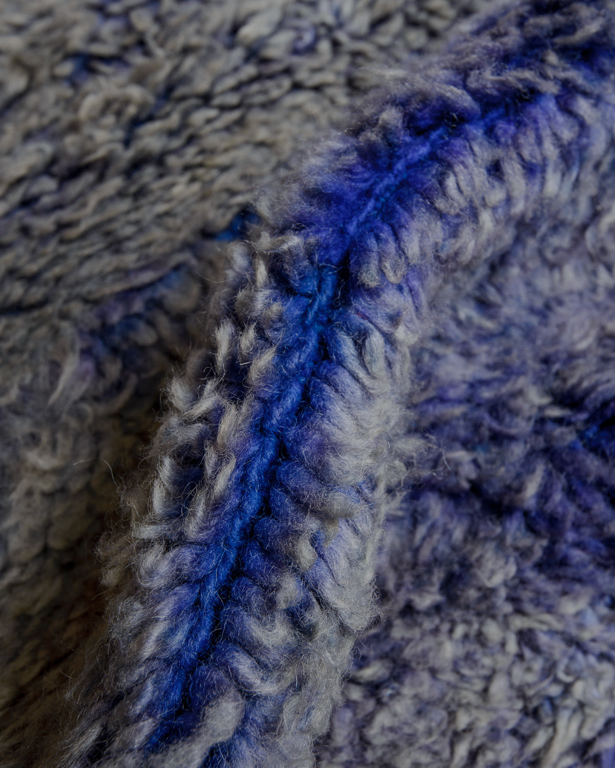 Close up of vintage boujaad rug showing length of pile and texture.