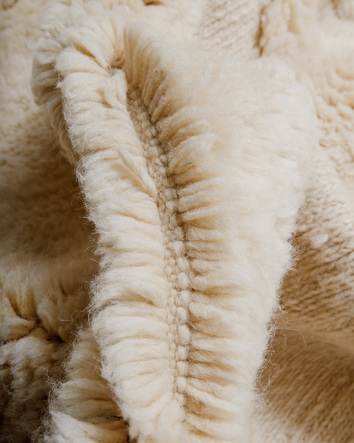 Close-up of cream wool rug