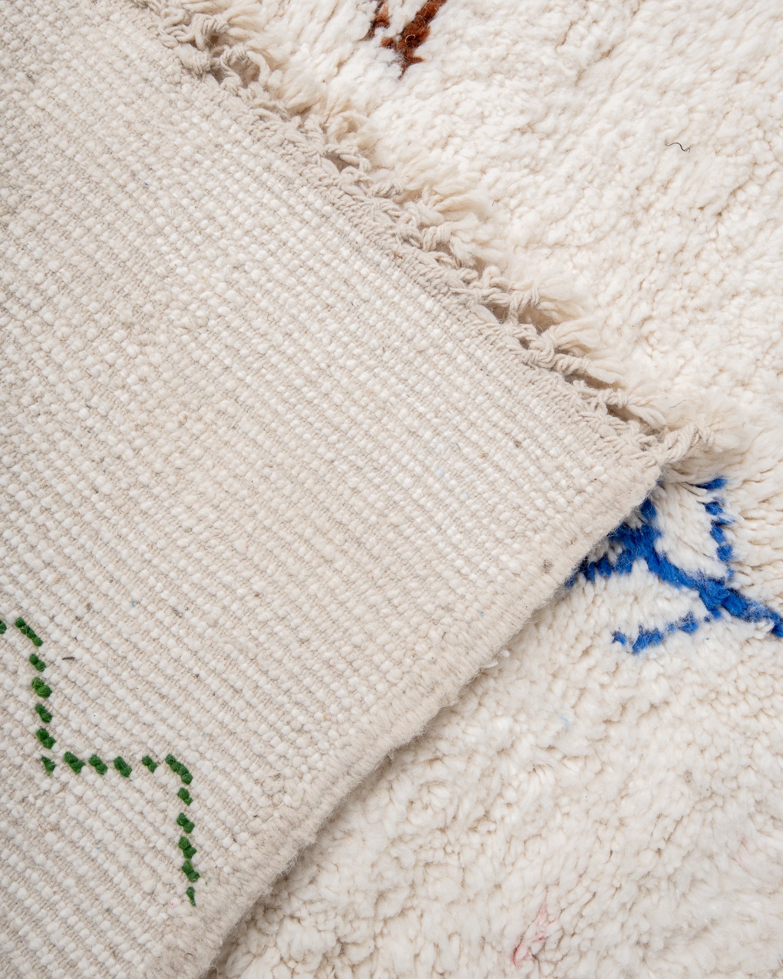 Modern, designer, handcrafted Berber rug from Morocco. Beniourain carpet with beautiful colours and patterns and fluffy wool texture. 