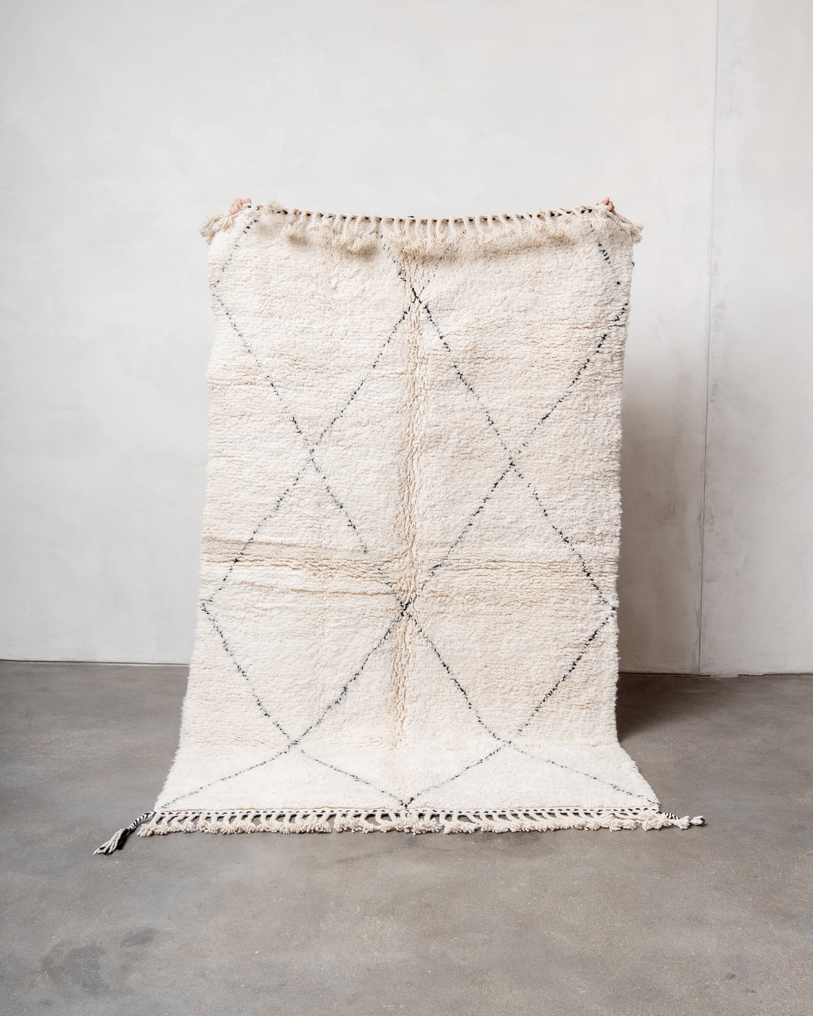 Modern, designer, handcrafted Berber rug from Morocco. Beniourain carpet with beautiful colours and patterns and fluffy wool texture.