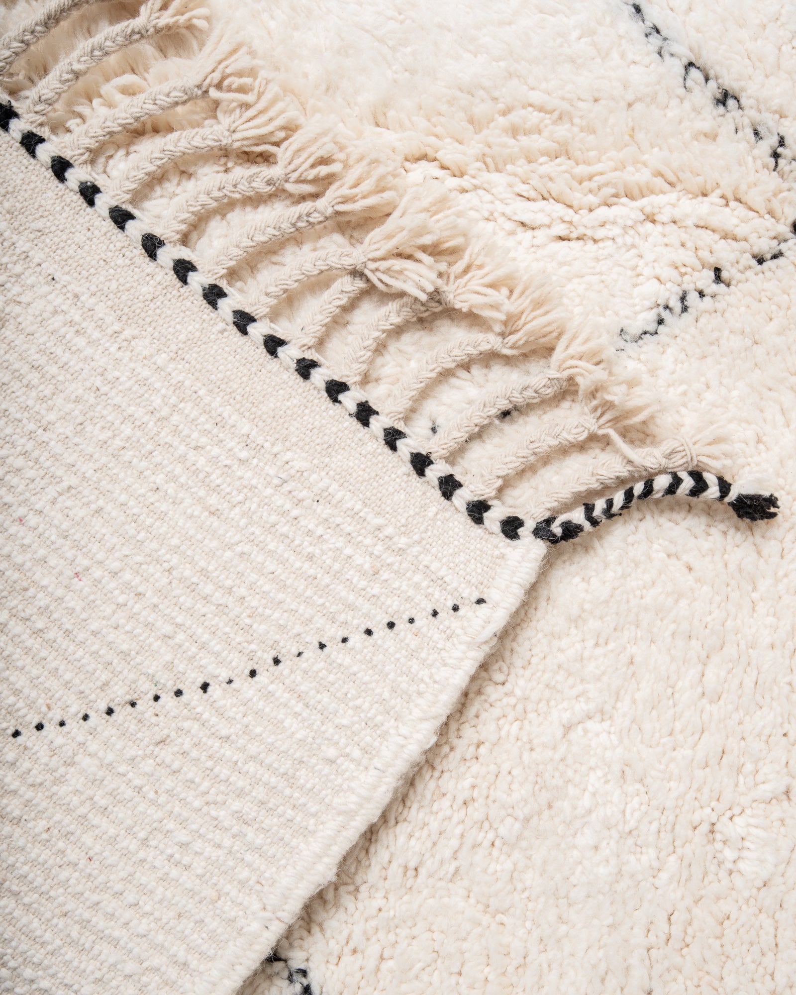 Modern, designer, handcrafted Berber rug from Morocco. Beniourain carpet with beautiful colours and patterns and fluffy wool texture.