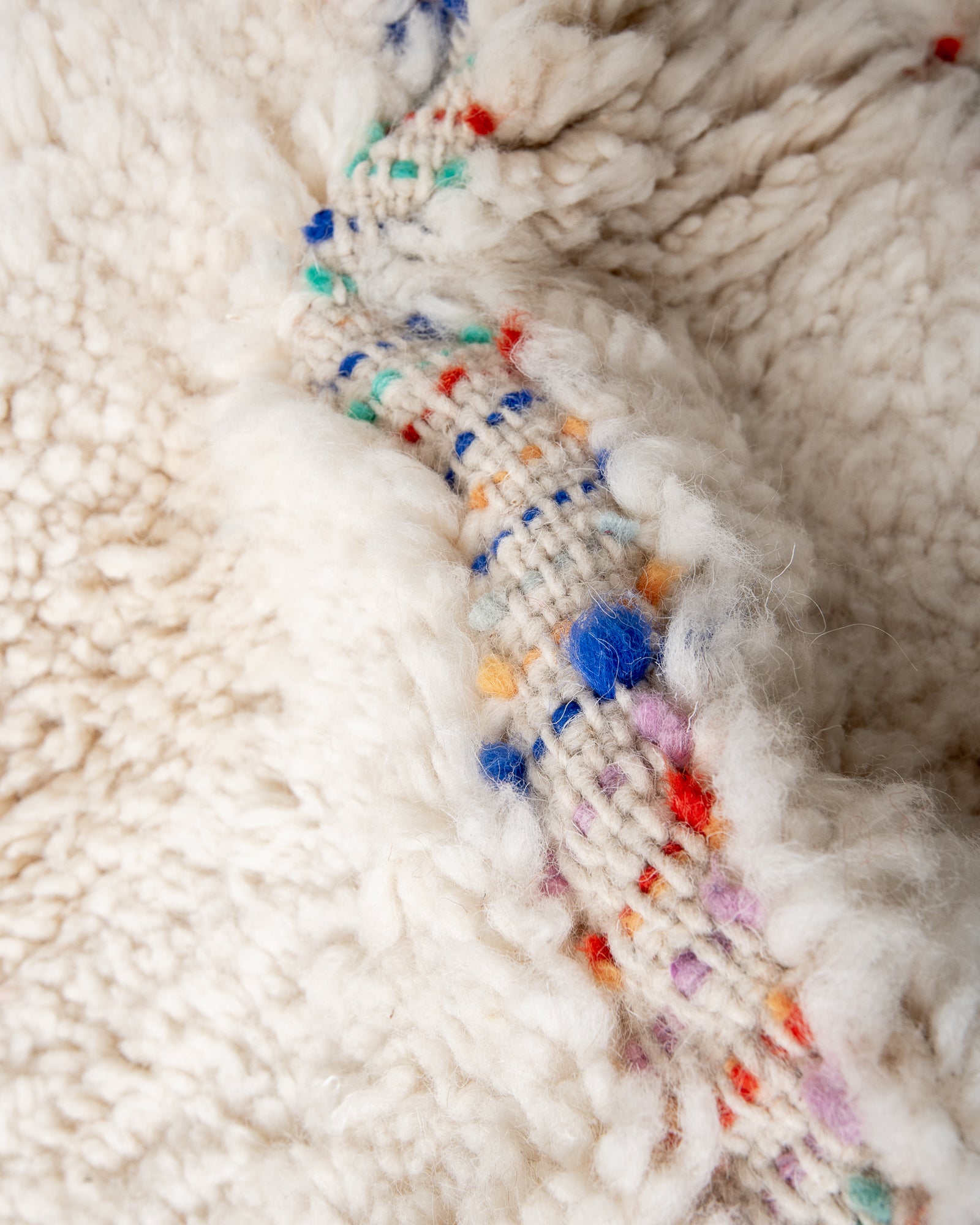 Modern, designer, handcrafted Berber rug from Morocco. Beniourain carpet with beautiful colours and patterns and fluffy wool texture. 