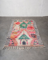 Modern designer handcrafted Berber rug from Morocco. Boujed with beautiful colors and patterns.