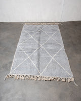 Modern, designer, handcrafted Berber rug from Morocco. Beniourain carpet with beautiful colours and patterns and fluffy wool texture. 