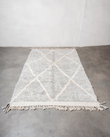 Modern, designer, handcrafted Berber rug from Morocco. Beniourain carpet with beautiful colours and patterns and fluffy wool texture. 