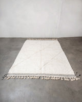 Modern, designer, handcrafted Berber rug from Morocco. Beniourain carpet with beautiful colours and patterns and fluffy wool texture. 