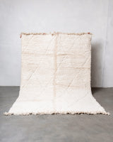 Modern, designer, handcrafted Berber rug from Morocco. Beniourain carpet with beautiful colours and patterns and fluffy wool texture. 
