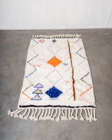 Modern, designer, handcrafted Berber rug from Morocco. Beniourain carpet with beautiful colours and patterns and fluffy wool texture. 