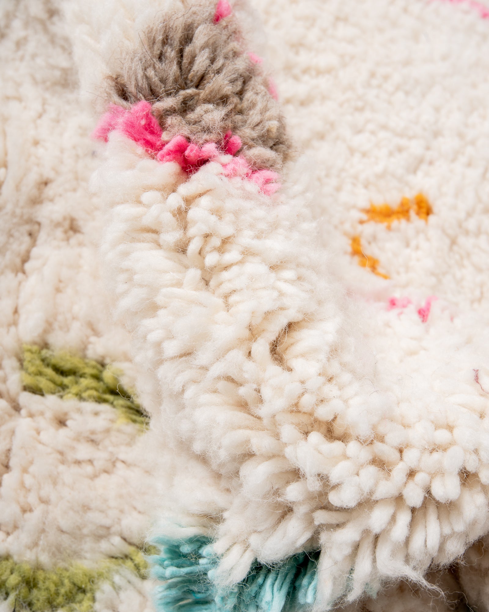 Modern, designer, handcrafted Berber rug from Morocco. Beniourain carpet with beautiful colours and patterns and fluffy wool texture.